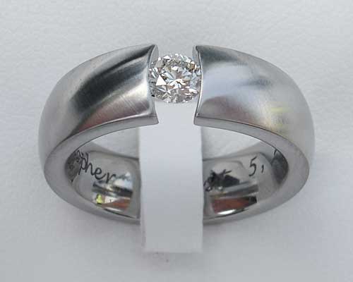 0.25ct diamond tension set engagement ring
