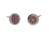 Floral titanium stud earrings capturing the beauty of blooming flowers