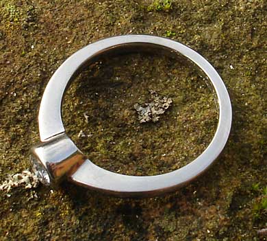 Bezel set titanium engagement ring