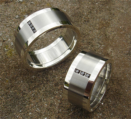 Black diamond wedding rings in stainless steel