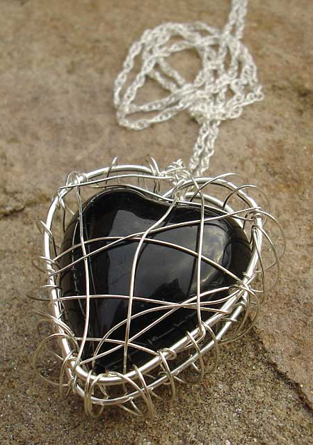 Black heart silver necklace
