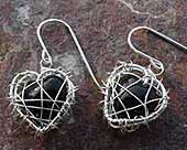 Caged heart shape drop earrings