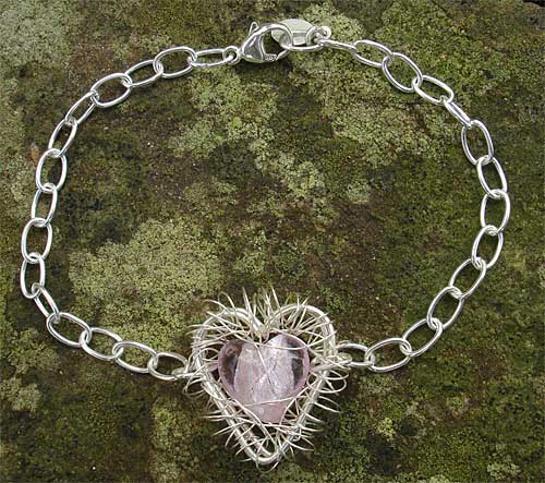 Caged heart silver bracelet for women
