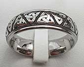 Titanium ring engraved with a Celtic Trinity knot pattern