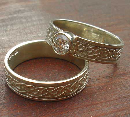 Celtic wedding ring and cubic zirconia Celtic engagement ring