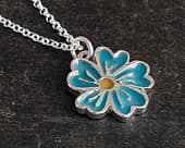 Charming flower-shaped pendant on a silver chain for women
