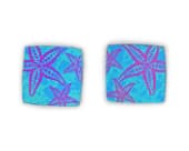 Starfish titanium stud earrings featuring a finely detailed starfish design