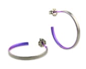 Titanium hoop earrings combining a classic profile with anodised colouring