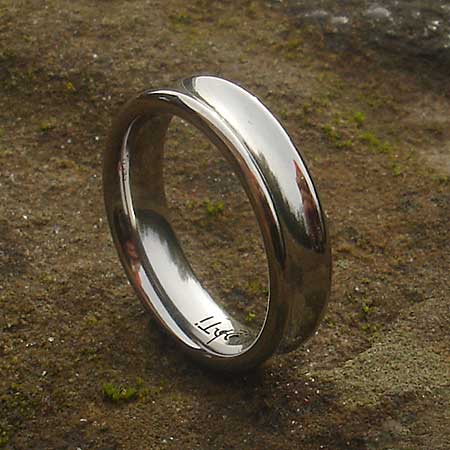 Concaved titanium wedding ring