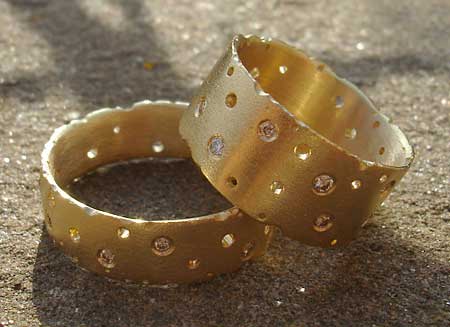 Contemporary 9ct gold diamond wedding rings