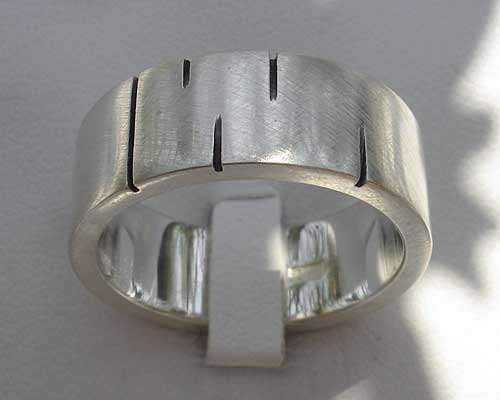 Contemporary etched silver wedding ring