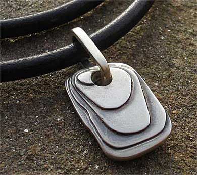 Contemporary silver pendant for men