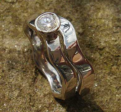 Contemporary silver wedding rings set
