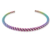 Rainbow titanium cuff bracelet in an elegant twisted coil design