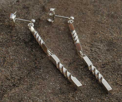 Designer silver drop stud earrings