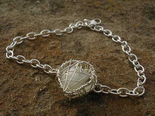 Designer silver heart bracelet for women