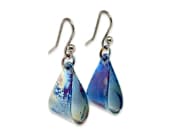 Titanium drop earrings featuring a distinctive flame-coloured finish