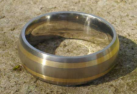 Domed gold inlay titanium wedding ring