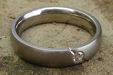 Domed white diamond wedding ring