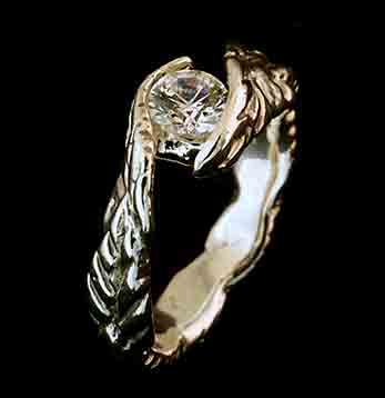Silver engagement ring with topaz