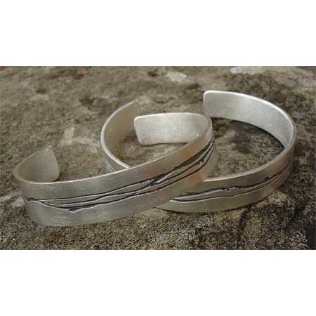 Etched designer cuff bracelets