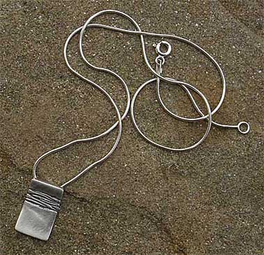 Etched silver necklace
