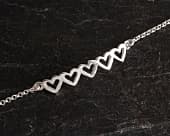 Five hearts symbolic love silver bracelet