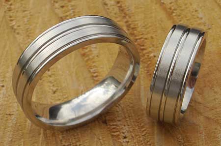 Flat grooved titanium wedding rings