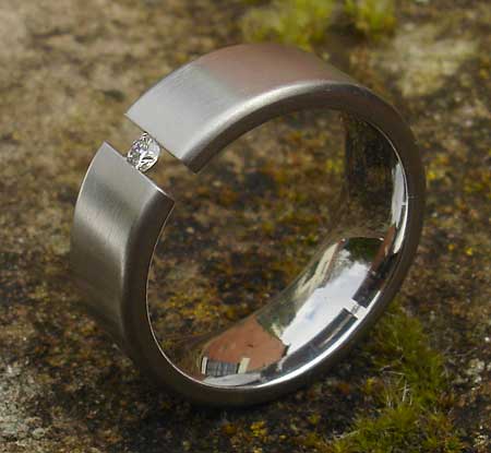 Tension set titanium engagement ring