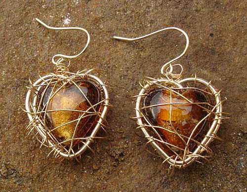 Gold caged heart drop earrings