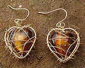 Gold caged heart drop earrings