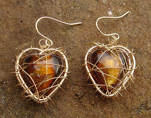 Gold caged heart earrings