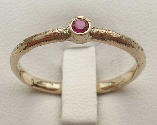 Gold ruby engagement ring