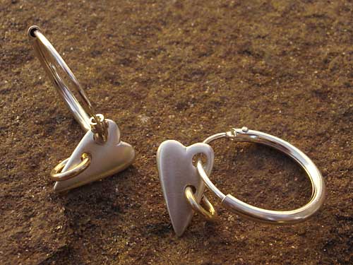 Gold and silver heart earrings