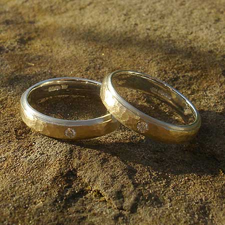 Hammered 9ct gold and silver diamond wedding rings