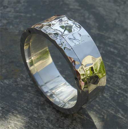 Hammered steel and silver wedding ring