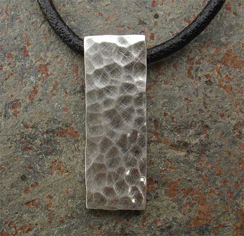Hammered silver pendant