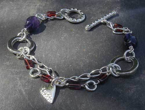 Handmade beaded silver heart bracelet