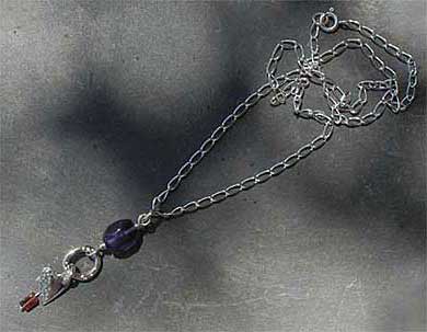 Handmade beaded silver heart necklace