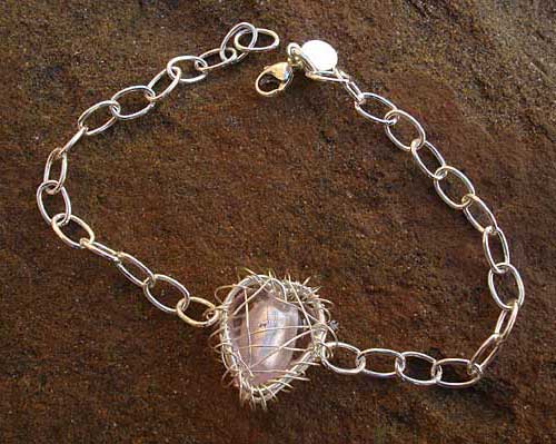 Handmade caged heart silver bracelet