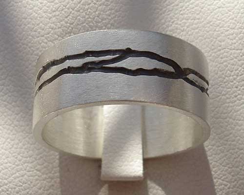 Handmade designer silver wedding ring