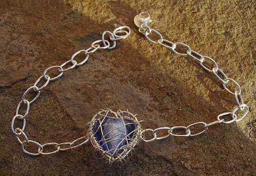 Handmade heart shaped silver bracelet
