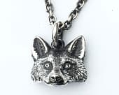 Finely detailed handmade fox head pendant on a chain