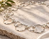 Contemporary necklace featuring graduated sterling silver circles