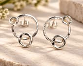 Overlapping design stud earrings handmade from textured sterling silver wire