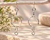 Handmade long drop earrings crafted from textured sterling silver wire