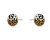 Round titanium stud earrings featuring a detailed leopard print design