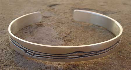 Mens and womens silver bracelet