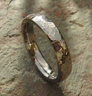 Narrow hammered titanium wedding ring