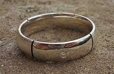 Domed sterling silver diamond wedding ring